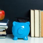 College graduate student diploma piggy bank